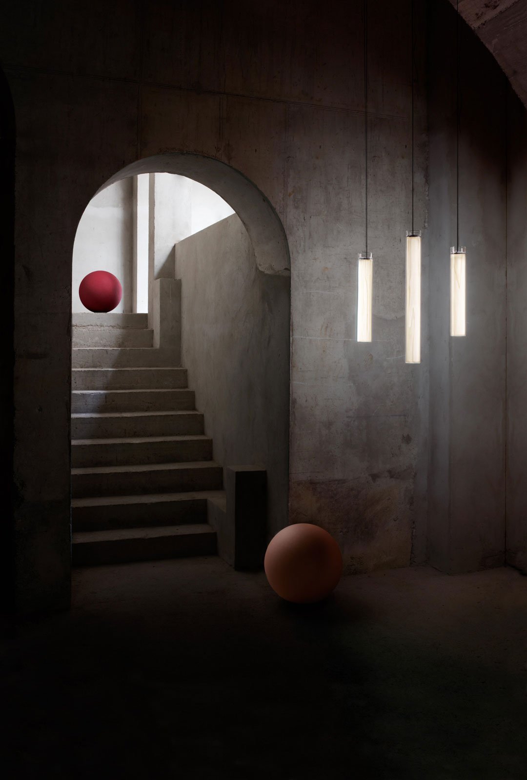 Composition of-LZF-glass-and-wood-lamps-in-an-architectural-space