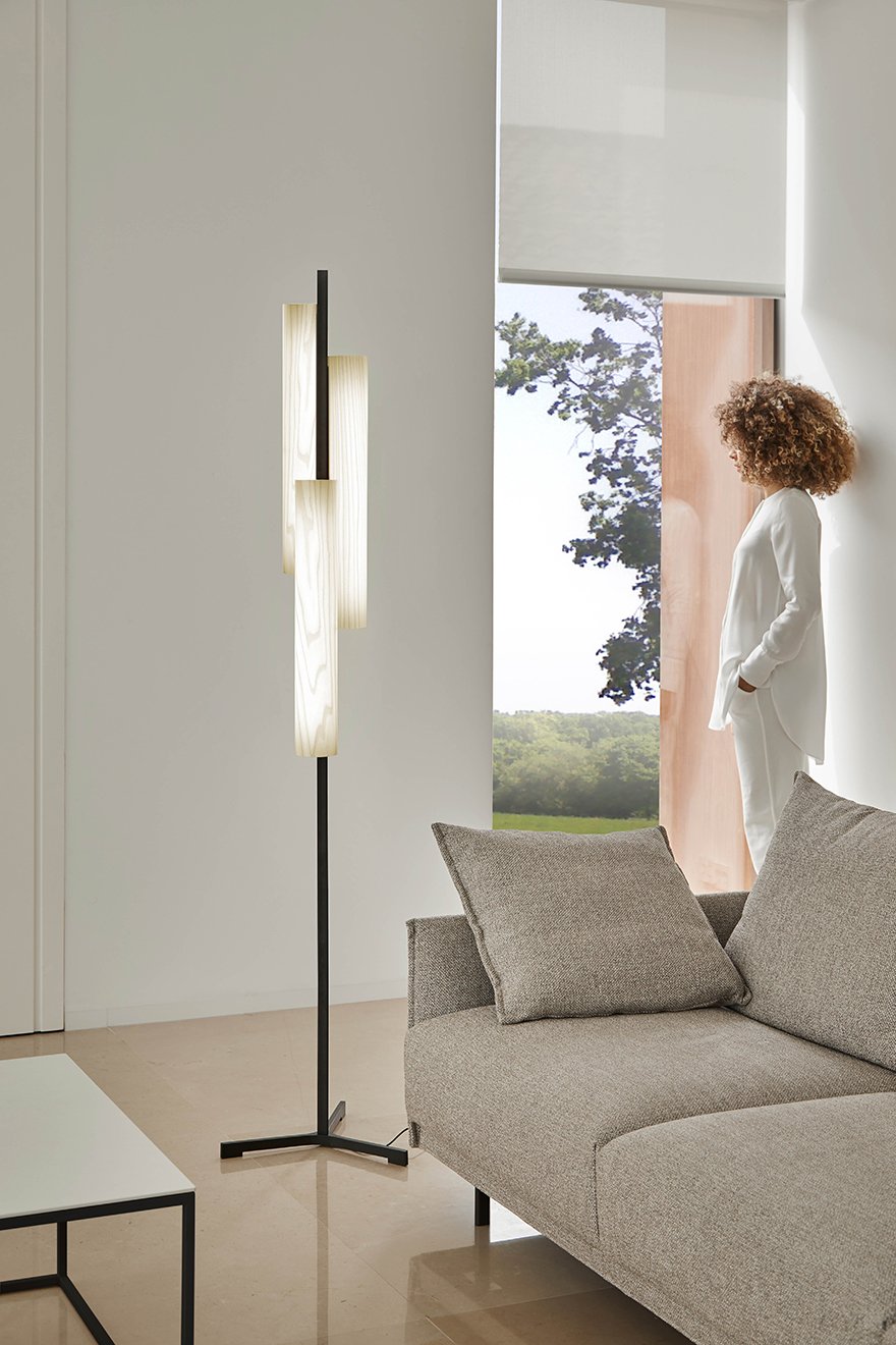 Detail of-a-living-room-with-the-LZF-Black-Note-floor-lamp-in-white-wood-and-black-metal