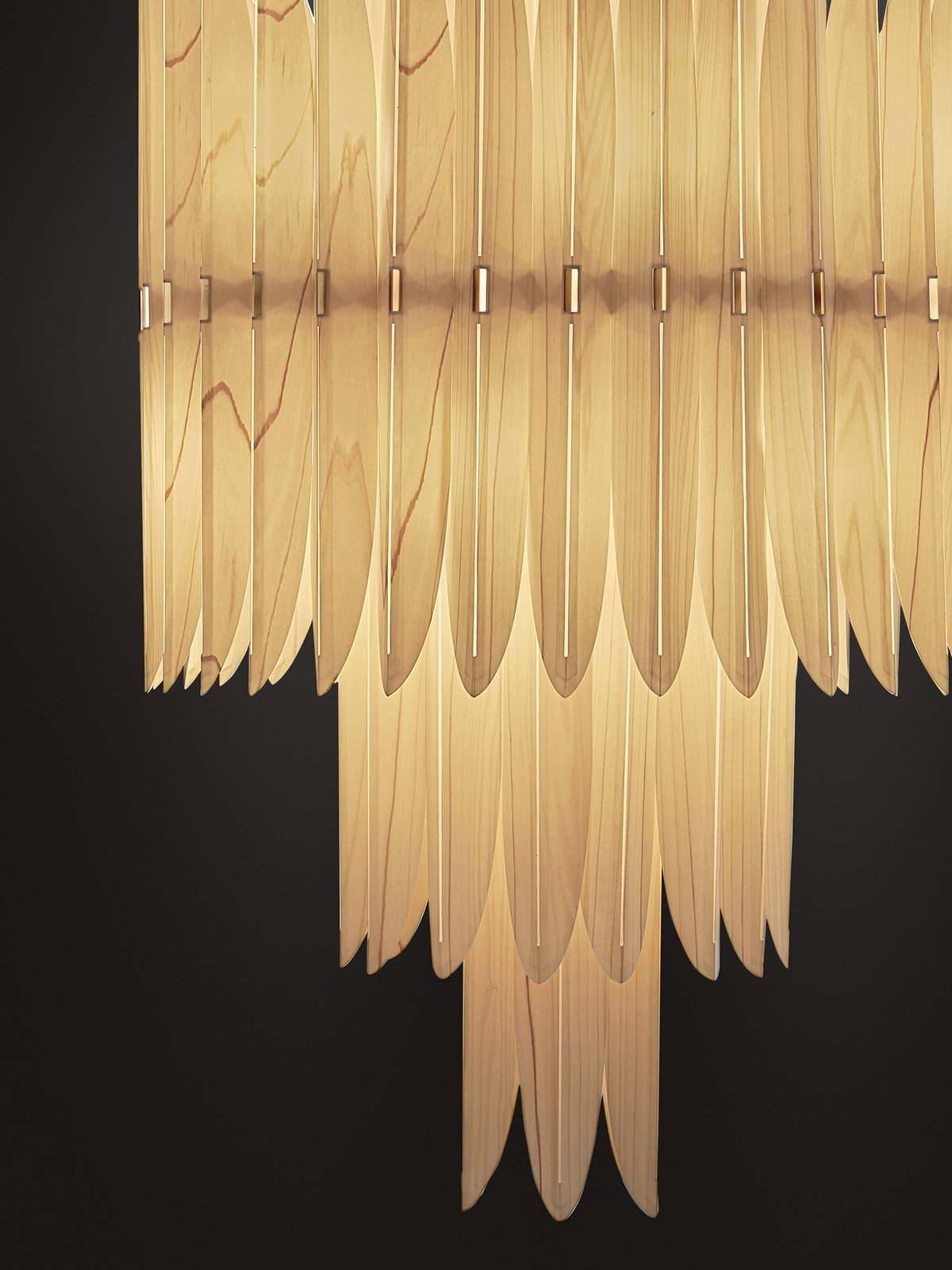 detail of-the-illuminated-wooden-feathers-of-the-voliere-lamp-by-lzf-company