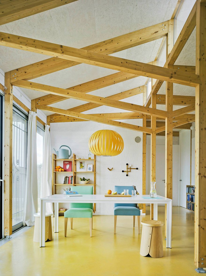 Dining area-with-wood-veneer-beams-and-LZF-yellow-wood-veneer-strip-lamp