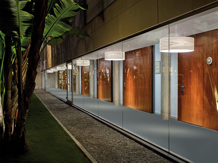 Hotel lobby-illuminated-with-LZF's-Gea-wooden-lamps-in-grey-color