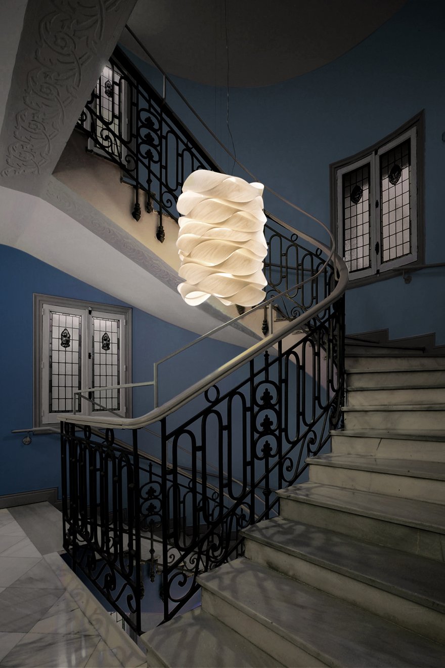 Hotel stairwell-illuminated-with-LZF-white-wooden-lamp