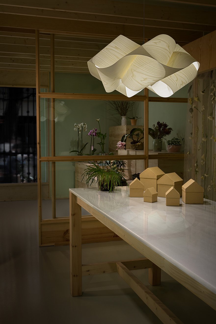 Illuminated flower-shop-with-the-beautiful-LZF-Swirl-lamp-in-natural-wood-veneer