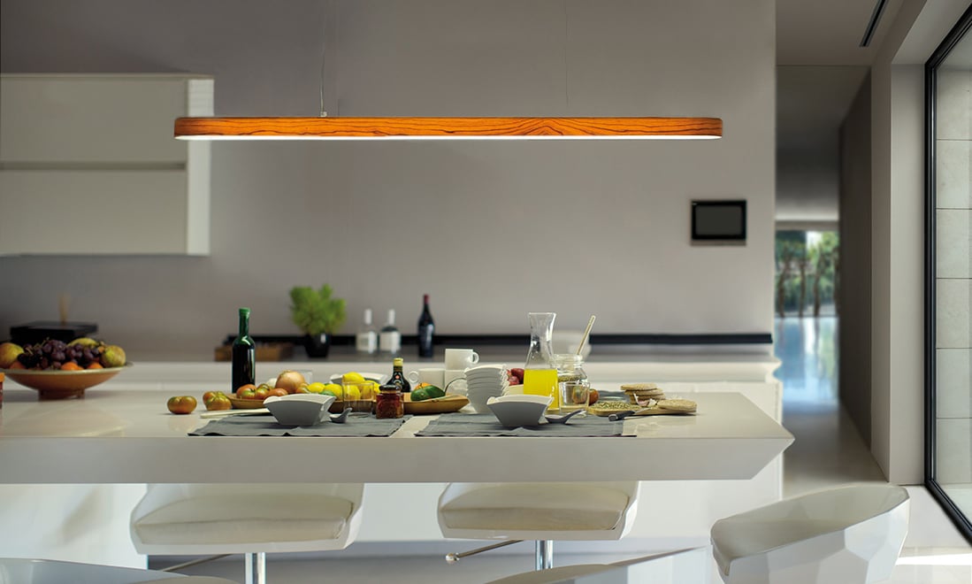 Wooden linear-lamp-on-modern-kitchen-island